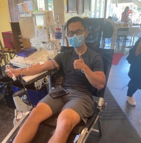 A student donating blood