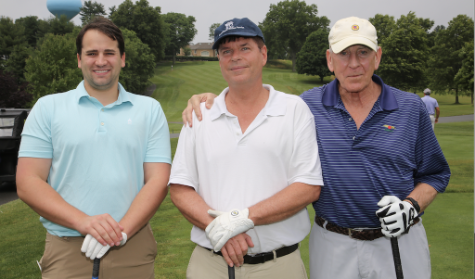 David E. Asprinio, center, M.D., chair and professor of clinical orthopaedic surgery, at the 2022 Golf Outing and Reception