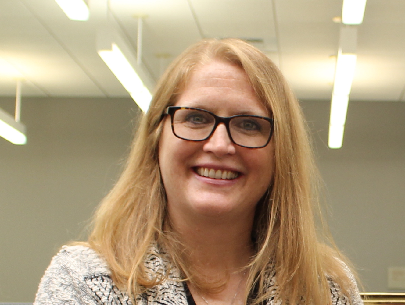 Headshot of Marie Ascher, M.S., M.P.H