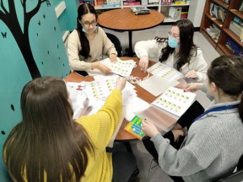 NYMC SLP students adapting books for patients at St. Mary's Hospital for Children