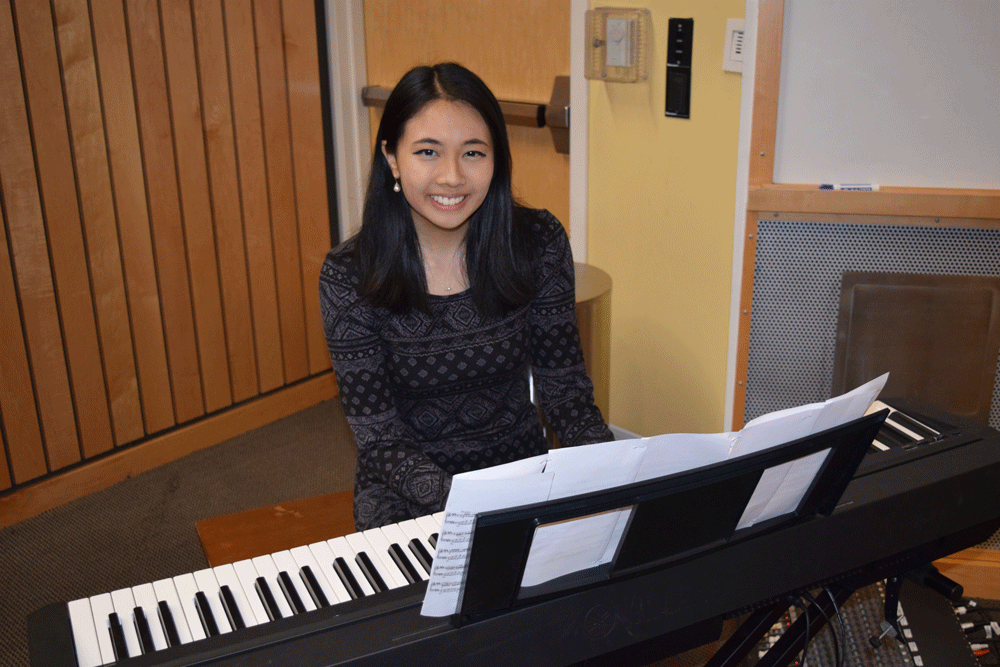 Woman Sitting by Piano Headshot