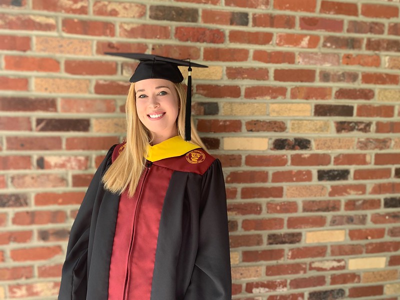 Student in Cap and Gown