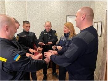 Major Tatiana Vatulova, psychologist in the State Emergency Service of Ukraine, Poltava, teaches BBM to Emergency Response Crews after they return from working at a mall that was bombed.