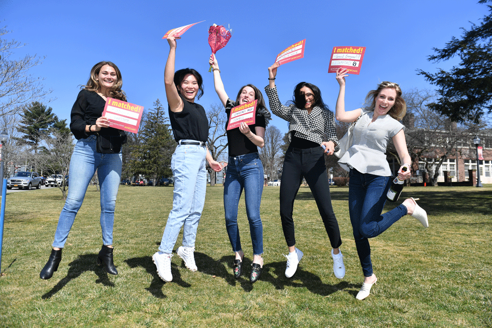 Students jump up in excitement at Match Day Class of 2022