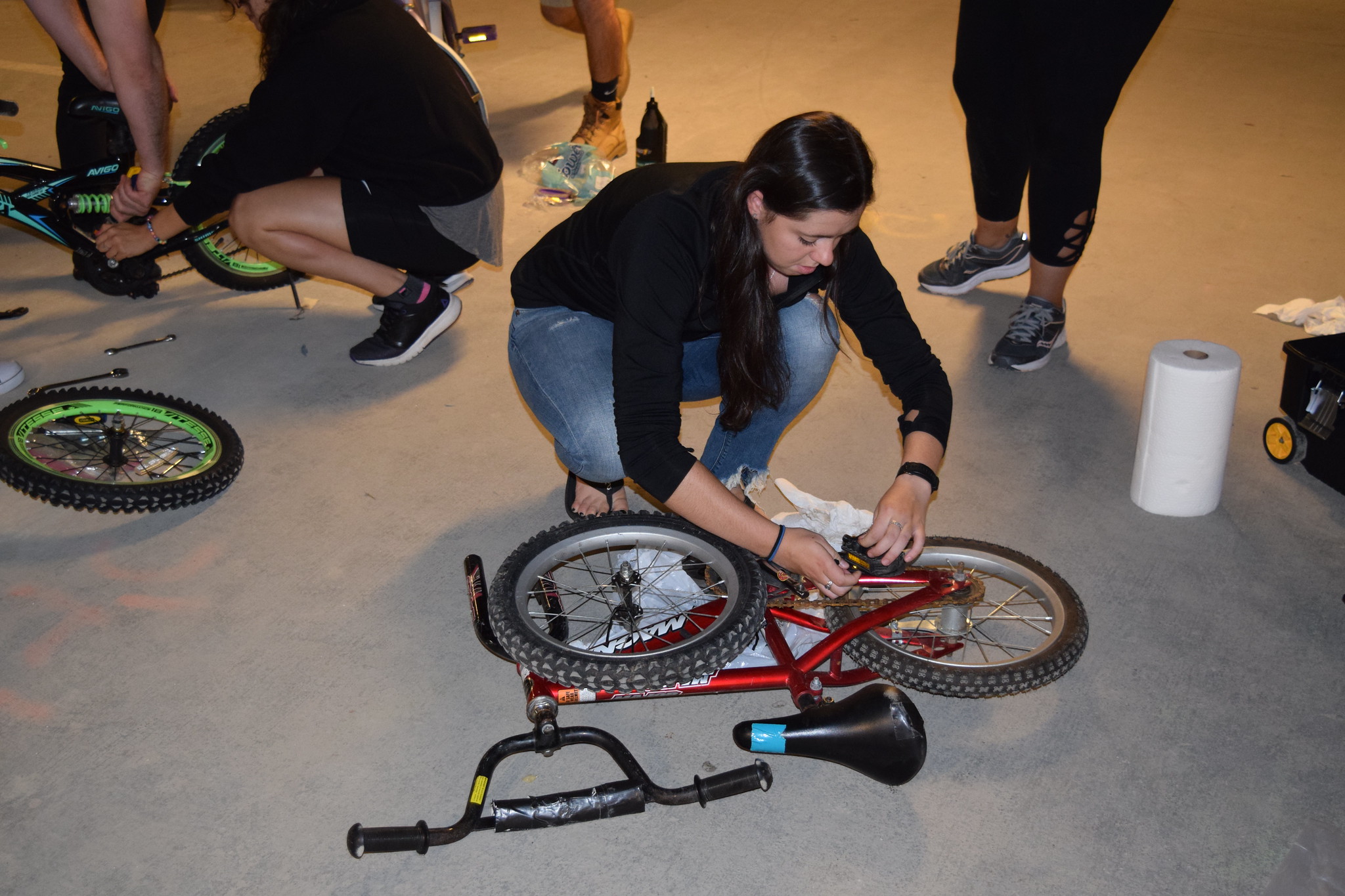 A DPT student and member of TeamGO builds a bike