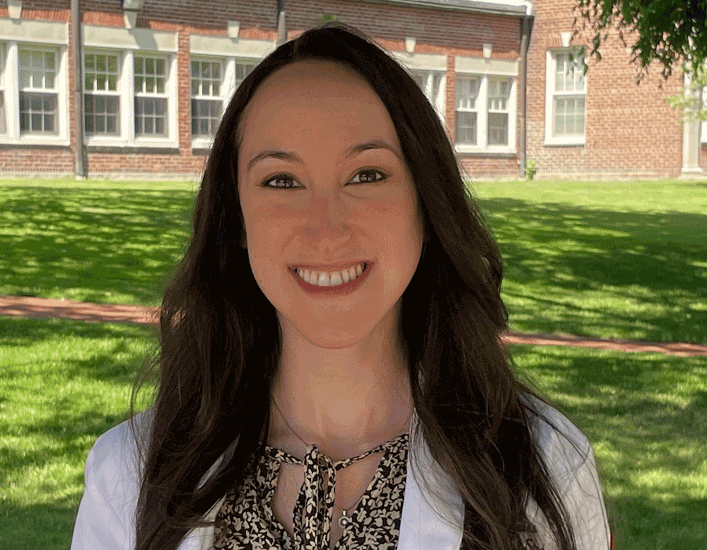 Madison Weiss outside with a white coat