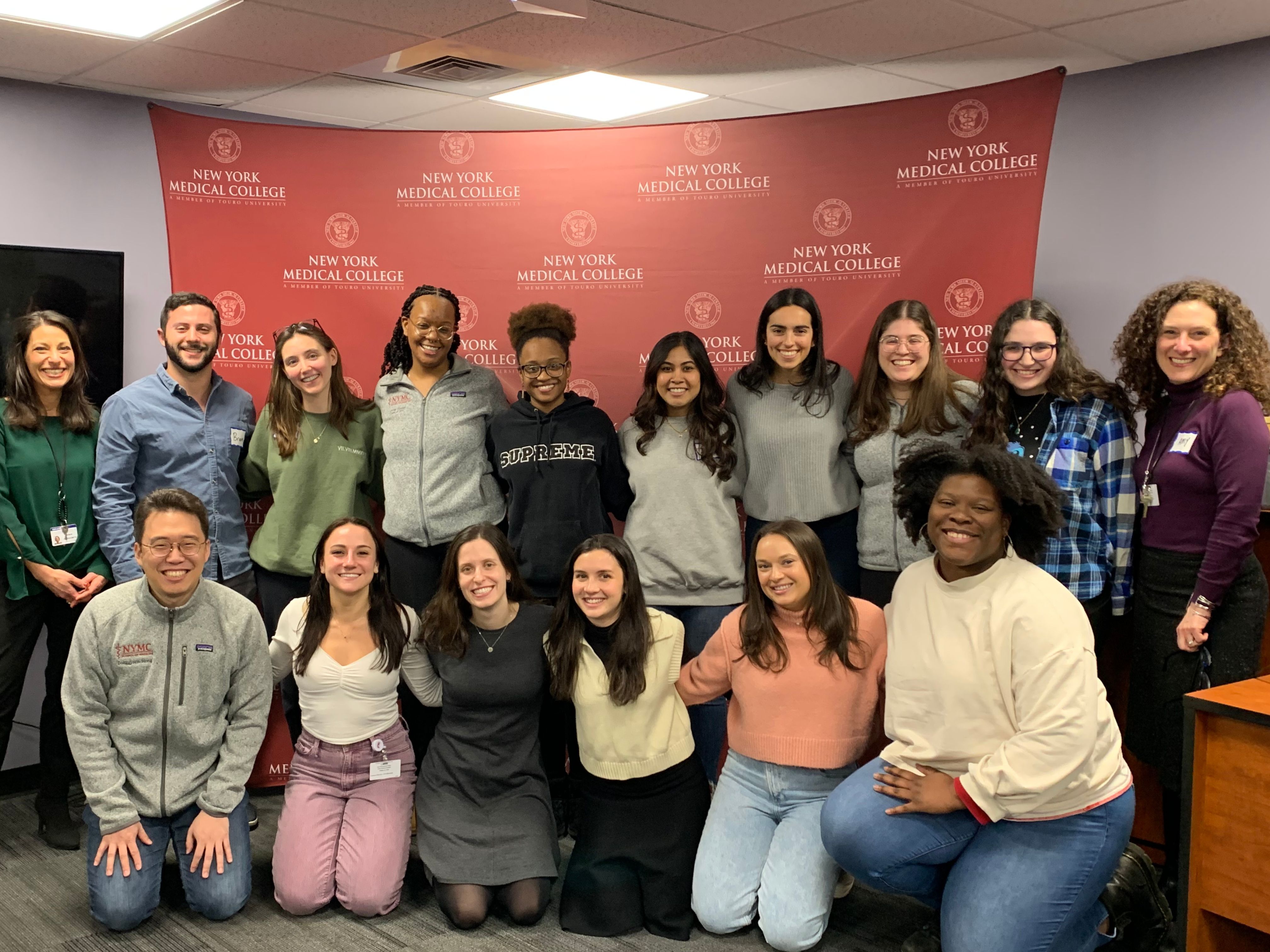 A group of students smiling after student wellness ambassador training