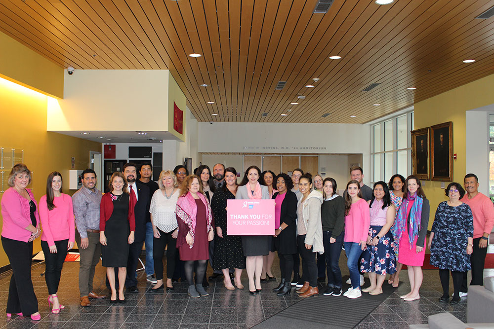 Marina K. Holz, Ph.D. and guests from the American Cancer Society, Inc participate in group headshot to show support for Breast Cancer Awareness Month