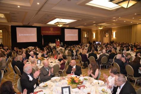 a group shot of packed tables at Founder's Dinner