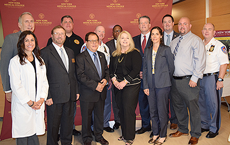 Administration, faculty, staff and elected officials gather at the Center of Excellence in Precision Responses to Bioterrorism and Disasters on the occasion of the awarding of $750,000 in funding from New York State.