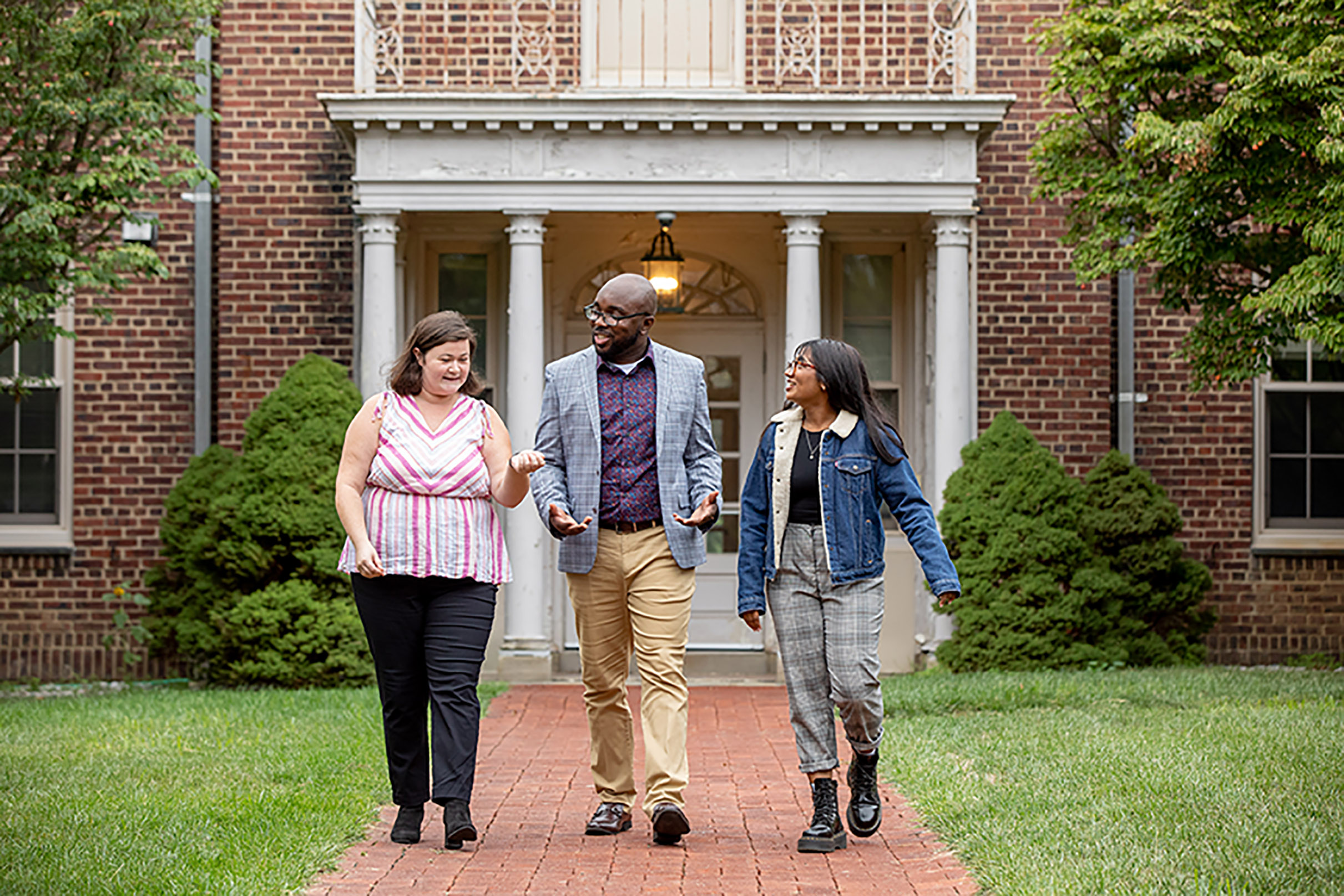 Group of SHSP students walking on campus