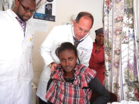 Dr. Schluger Treating Patient in East Africa