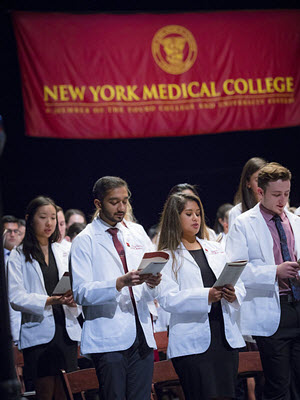 SOM Students donning their white coats for the first time